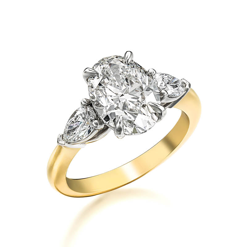 KNAR Signature Yellow Gold 3ct Oval Cut Diamond Engagement Ring with Pear Diamond Shoulders